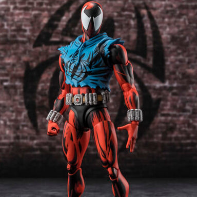 Action figure with red and blue costume against a brick wall background