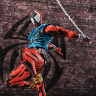 Action figure of a superhero in red and blue costume with a brick wall background
